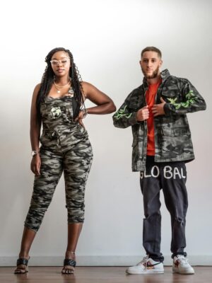 Models showcase trendy camo outfits on a white studio backdrop.